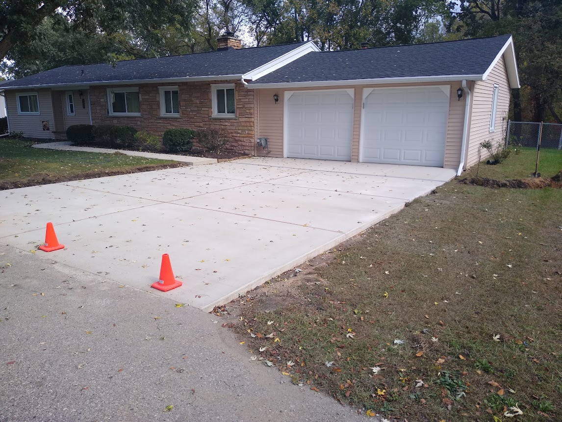 New concrete driveway and sidewalk